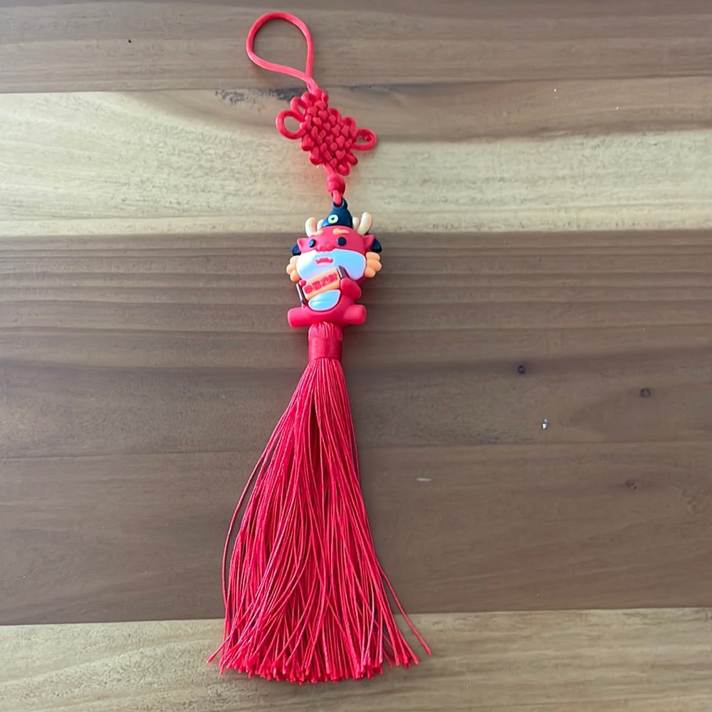 red year of the dragon pendent with tassel